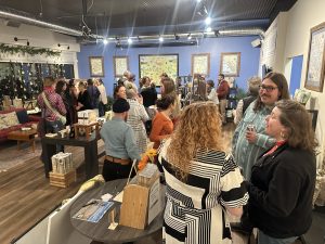 Guests attending a First Friday event at Xplorer Maps Headquarters.