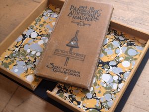 A vintage atlas in a custom clamshell box