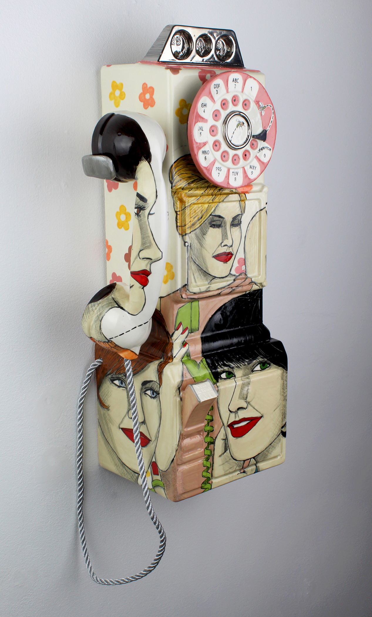 Ceramic payphone sculpture with illustration