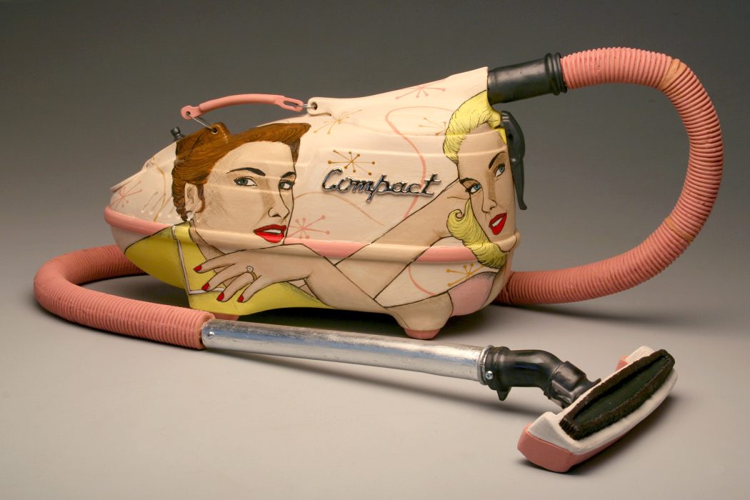 Ceramic sculpture of a vacuum with illustration