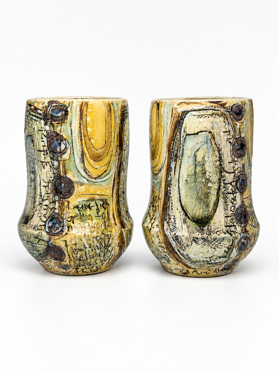 two ceramic tumblers